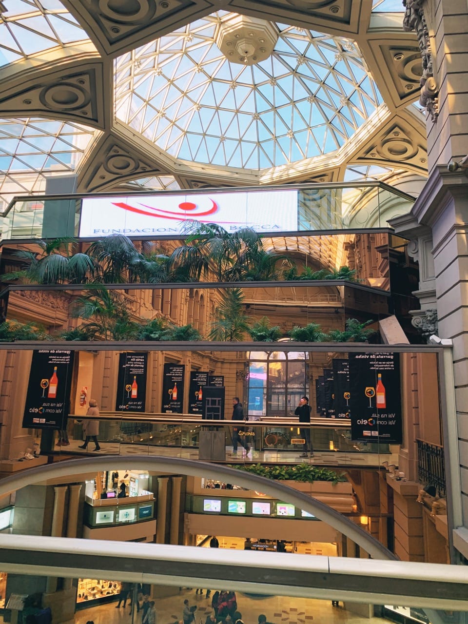 mall in argentina, geometric dome open top window with mirrors and tree decor